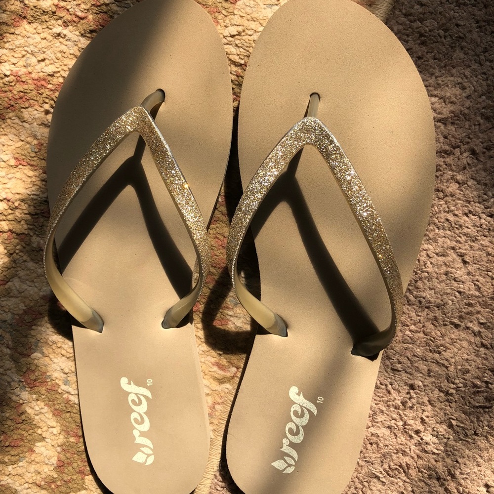 Brand new gold Reef women’s flip flops.